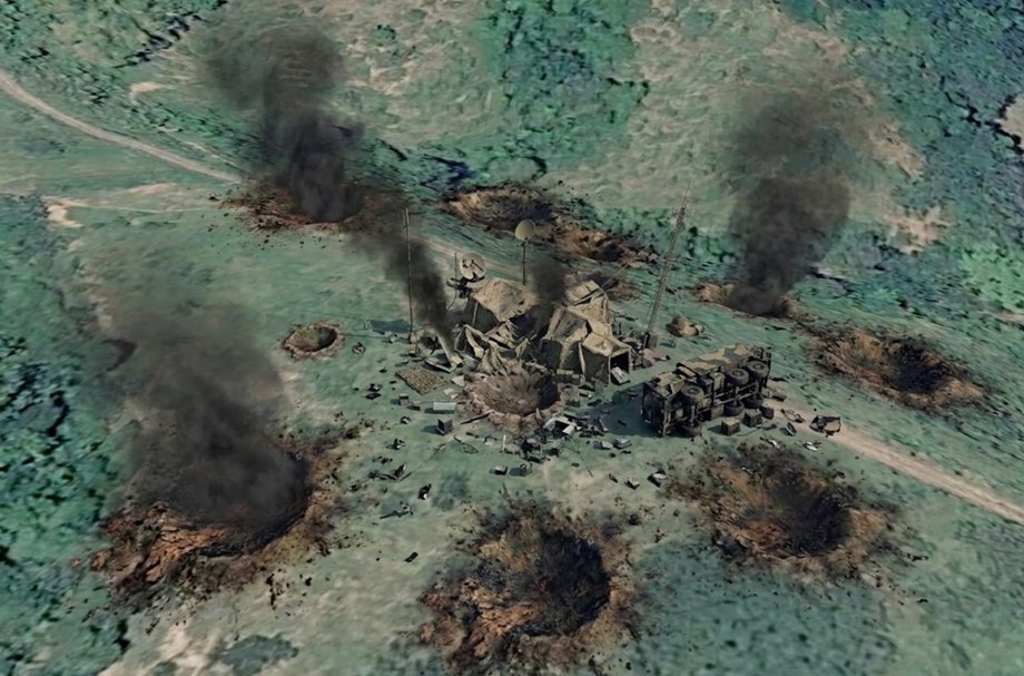 The same command post after the second attack. Every tent is flattened, the command vehicle is lying on its side, and several craters around the site are burning.